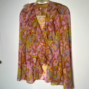 Free People printed top. Retro inspired style. Long sleeve. hook-front. ruffles